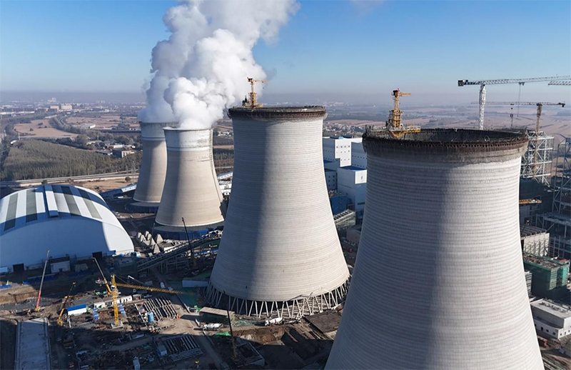 筑顶冰城暖源！国能哈热二期项目3号排烟冷却塔顺利封顶